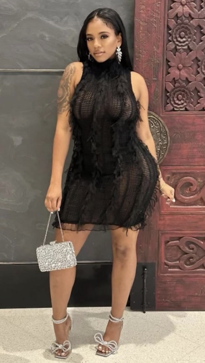 Stacks in elegant black dress